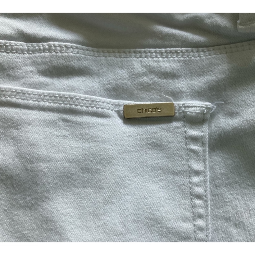 Chico’s white straight legged denim ankle jeans